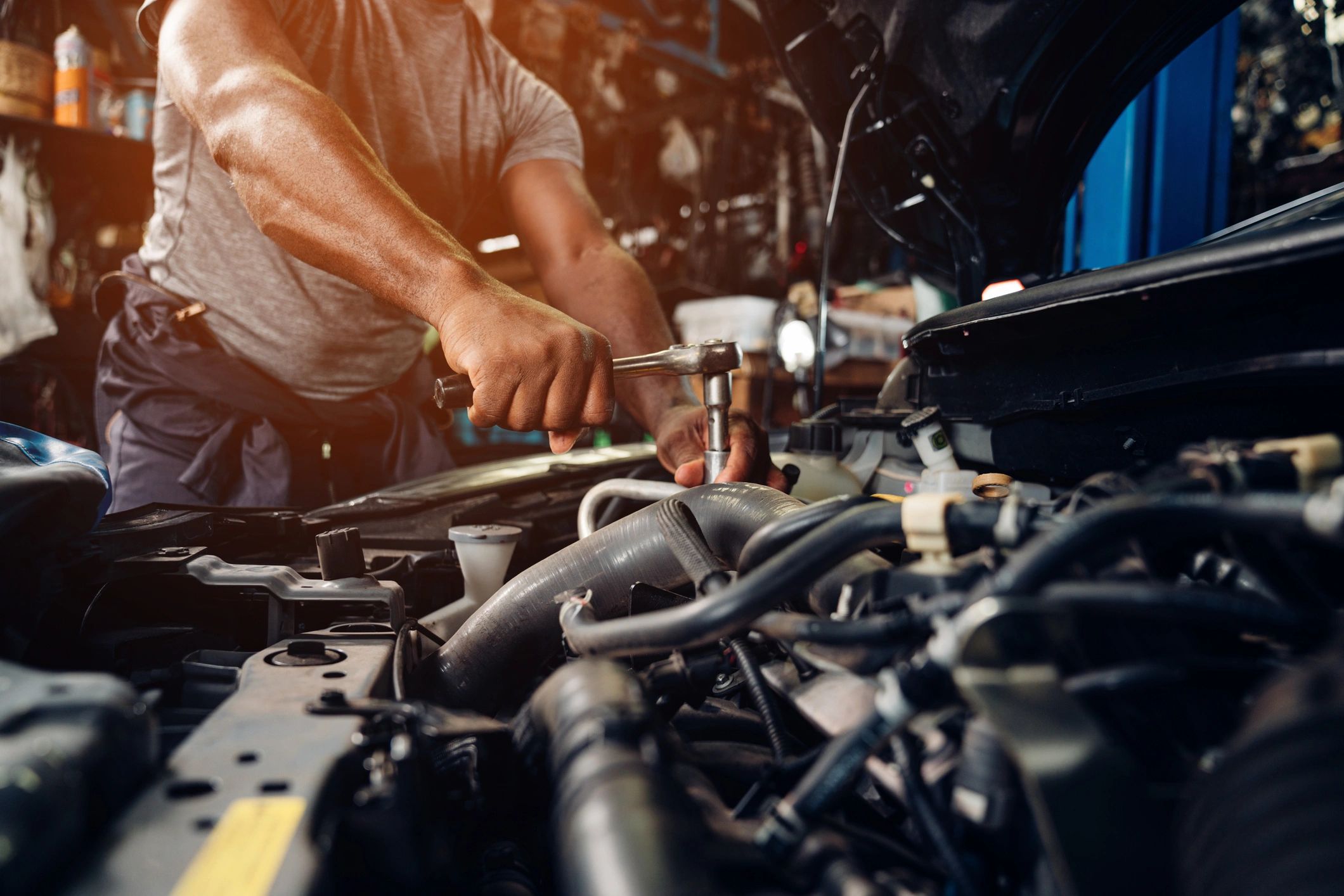 Mechanic repairing an automobile engine