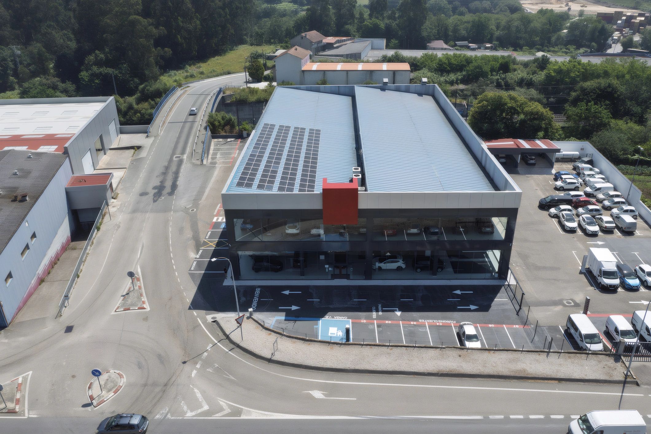 Car dealership building and vehicle lot